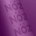 Load image into Gallery viewer, Zoomed in purple Nözscreen bottle
